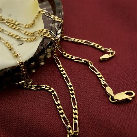 18 Krt. Gouden Figaro ketting .